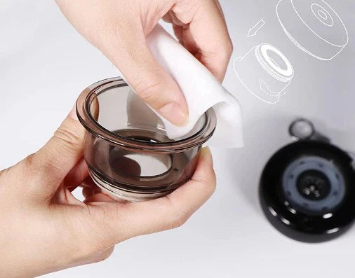 Zyvoura electric vacuum cupping massager for cleaning and relaxation, featuring a handheld device with a sleek design and adjustable controls.